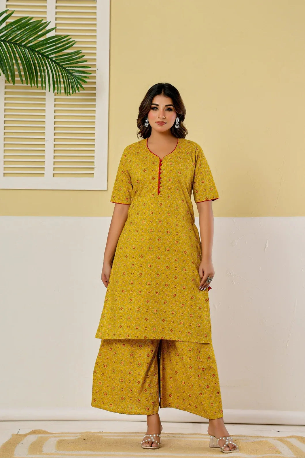 Woman in mustard yellow kurta palazzo set, full length ethnic wear - YAVASTRAH