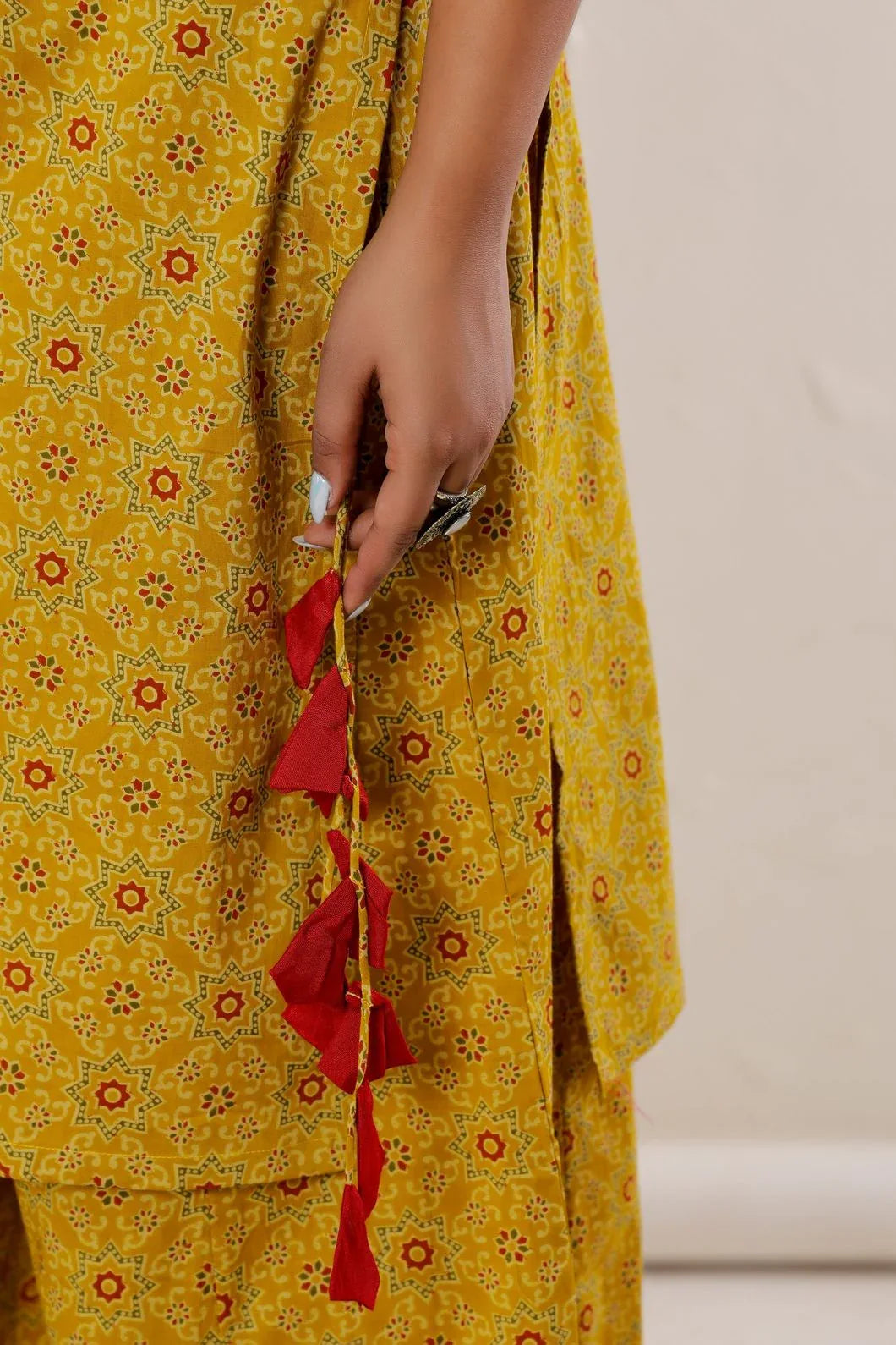 Mustard yellow kurta palazzo set laid flat showing close outfit - YAVASTRAH