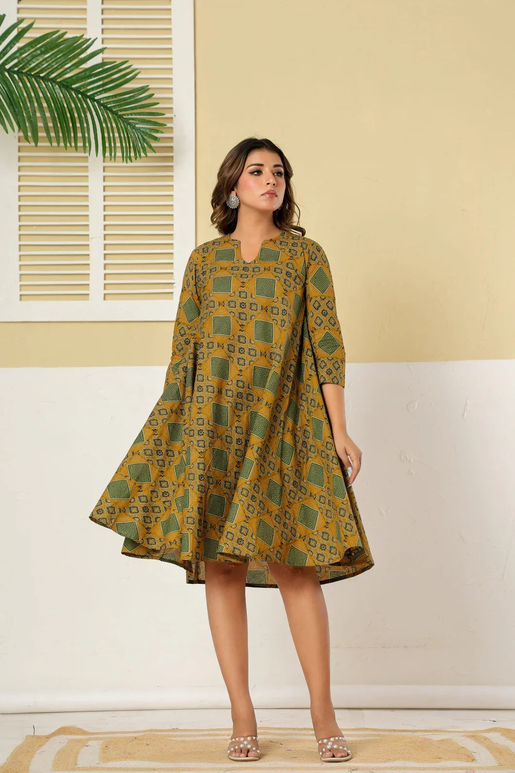Close-up of floral print detail on mustard green A-line dress - YAVASTRAH