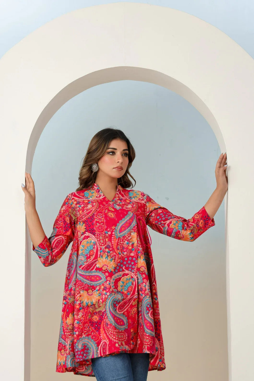 Woman in rani pink paisley angrakha kurti, full length view - YAVASTRAH
