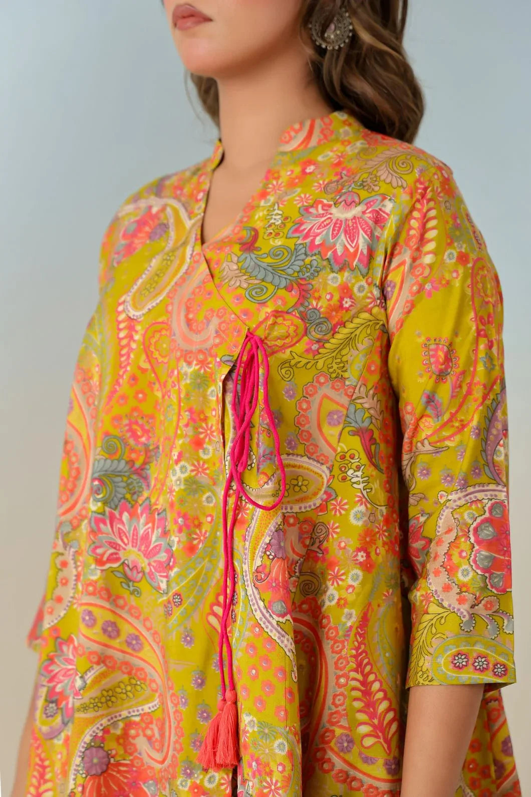 Colorful floral and paisley patterned kurta with a bright yellow background YAVASTRAH