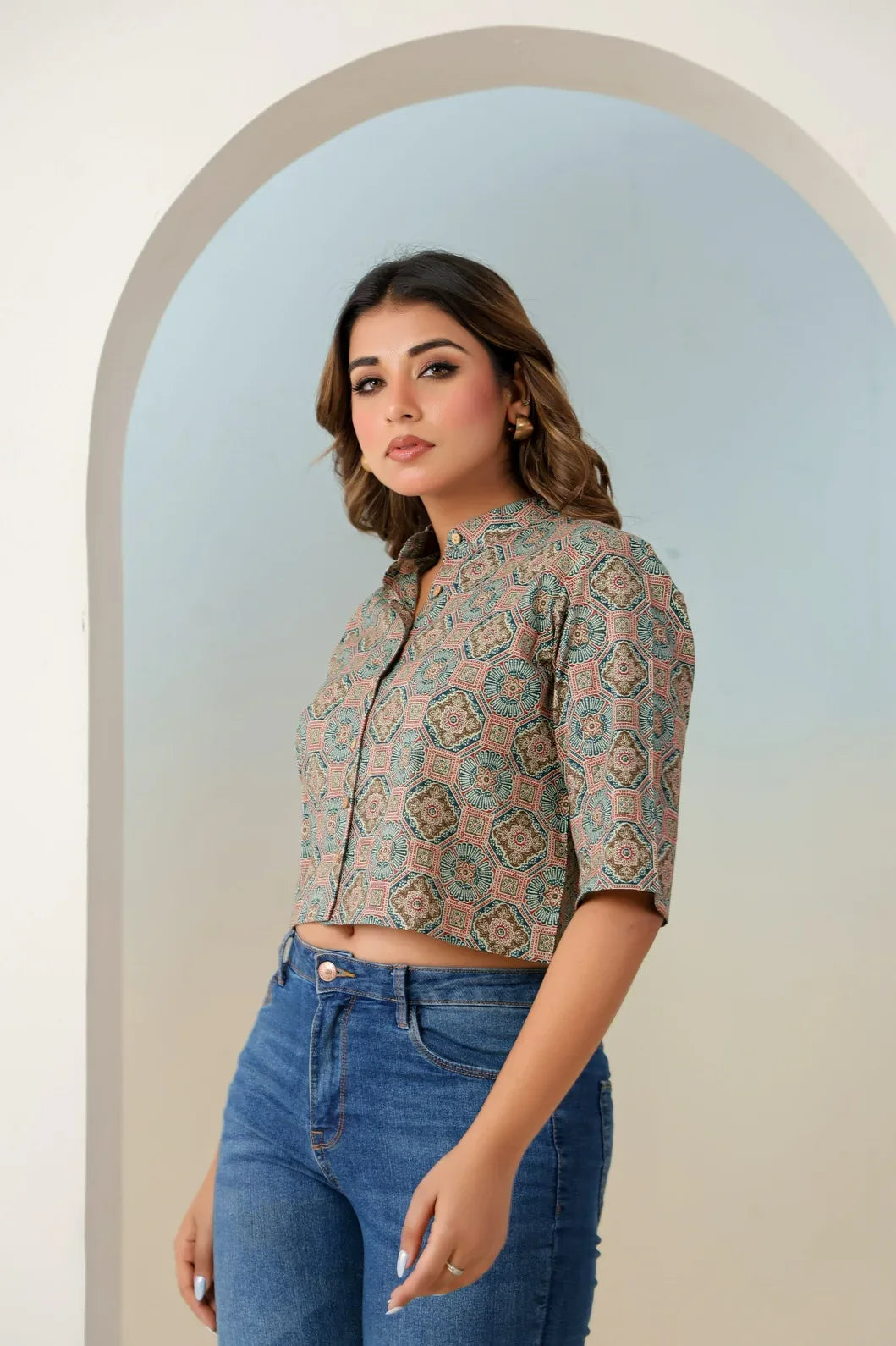 Teal green ethnic crop top side view showing motif print and fit - YAVASTRAH
