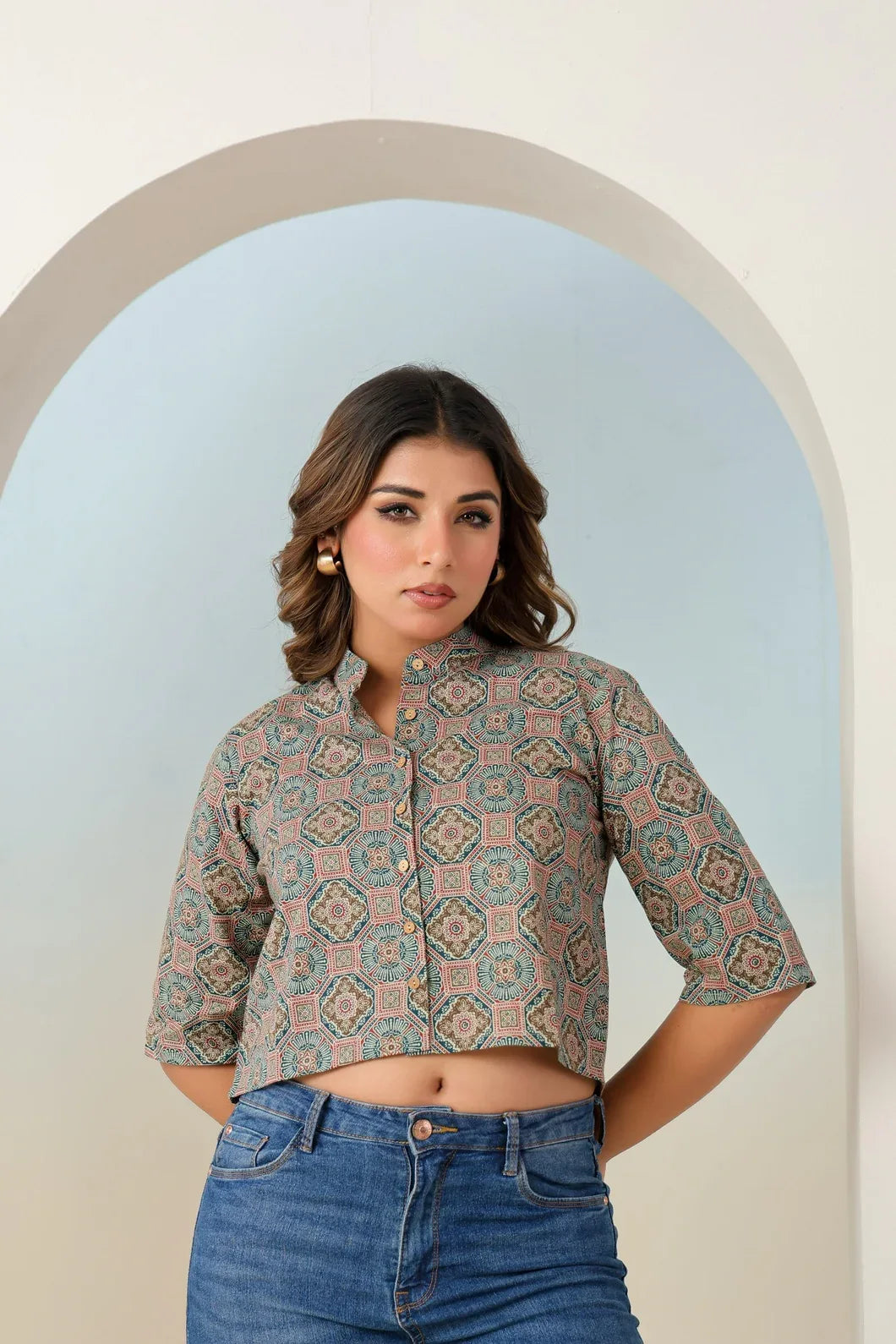 Close-up of teal green crop top neckline and ethnic motif detail - YAVASTRAH
