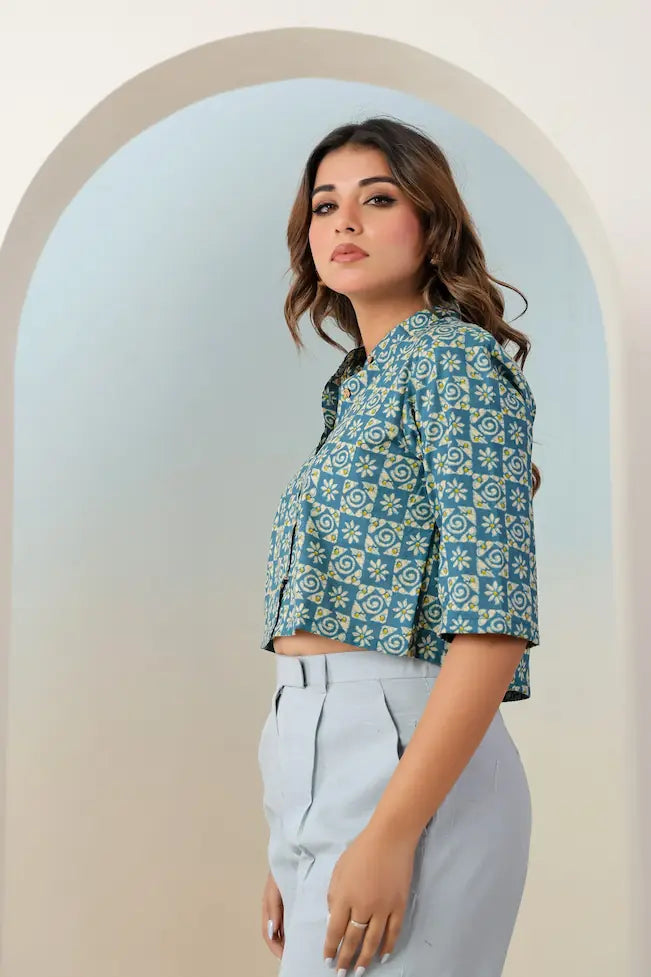 Woman wearing teal blue crop top styled with ethnic bottom wear - YAVASTRAH