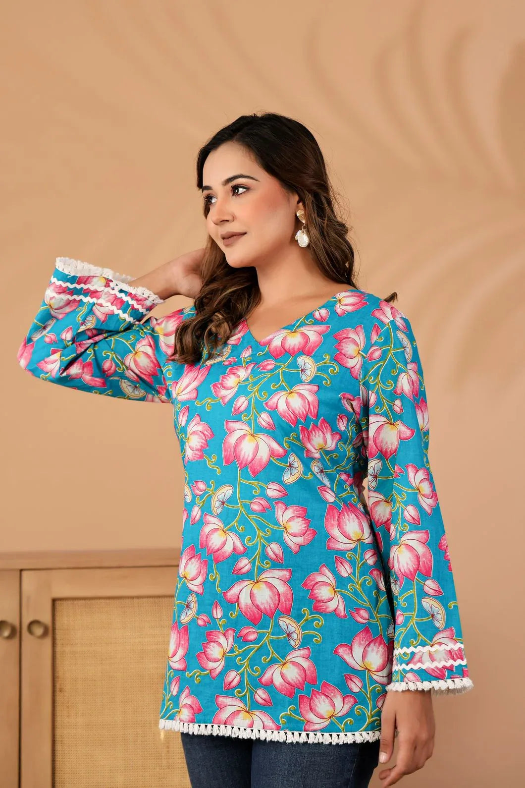 side view of floral print detail on teal blue cotton kurti - YAVASTRAH
