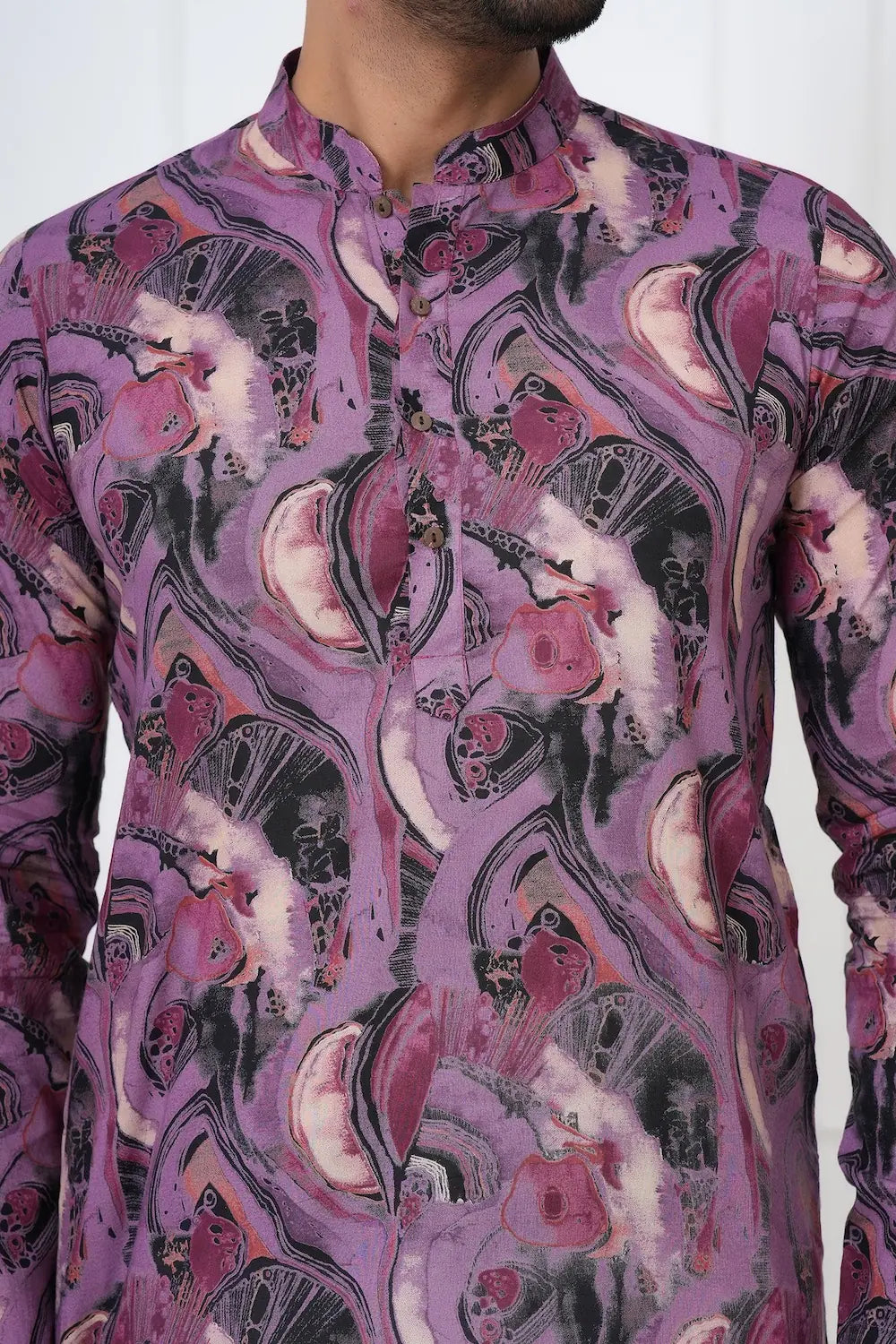 Purple patterned shirt worn by a person